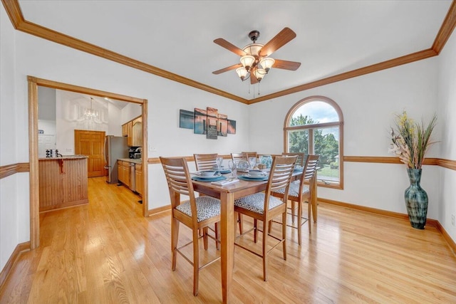 1165 Joffrey Dr, Huddleston, VA 24104 - dining room with light wood-type flooring, ornamental molding, ceiling fan, baseboards, and a chandelier