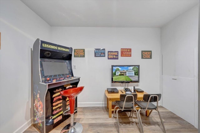1165 Joffrey Dr, Huddleston, VA 24104 - recreation room featuring wood finished floors, an office area, and baseboards