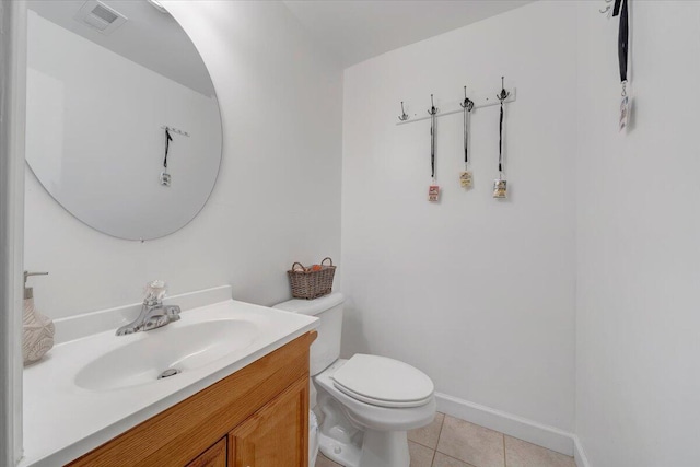 1165 Joffrey Dr, Huddleston, VA 24104 - half bathroom with tile patterned flooring, toilet, vanity, and baseboards