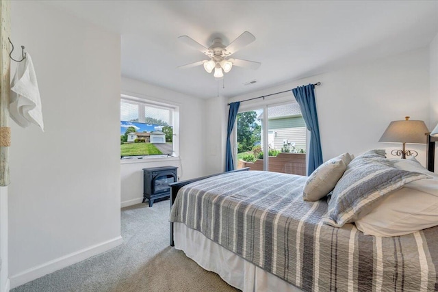 1165 Joffrey Dr, Huddleston, VA 24104 - bedroom featuring baseboards, multiple windows, light colored carpet, and a ceiling fan