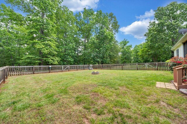 1165 Joffrey Dr, Huddleston, VA 24104 - view of yard with an outdoor fire pit