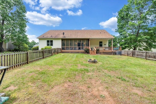 1165 Joffrey Dr, Huddleston, VA 24104 - back of property with an outdoor fire pit, a sunroom, a deck, and central AC unit