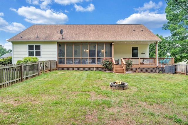 1165 Joffrey Dr, Huddleston, VA 24104 - back of property with an outdoor fire pit, a sunroom, a wooden deck, and central air condition unit