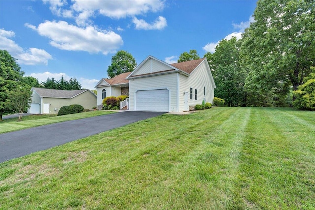 1165 Joffrey Dr, Huddleston, VA 24104 - ranch-style house featuring an attached garage, driveway, and a front lawn