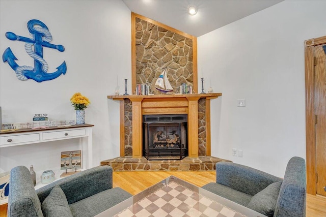 1165 Joffrey Dr, Huddleston, VA 24104 - living area featuring wood finished floors and a fireplace