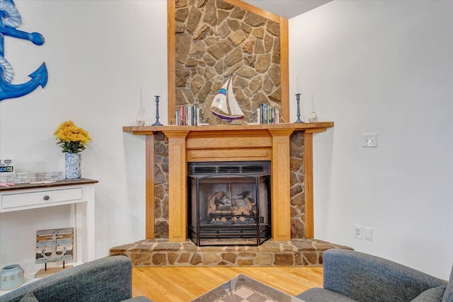 1165 Joffrey Dr, Huddleston, VA 24104 - detailed view of wood finished floors and a fireplace with raised hearth