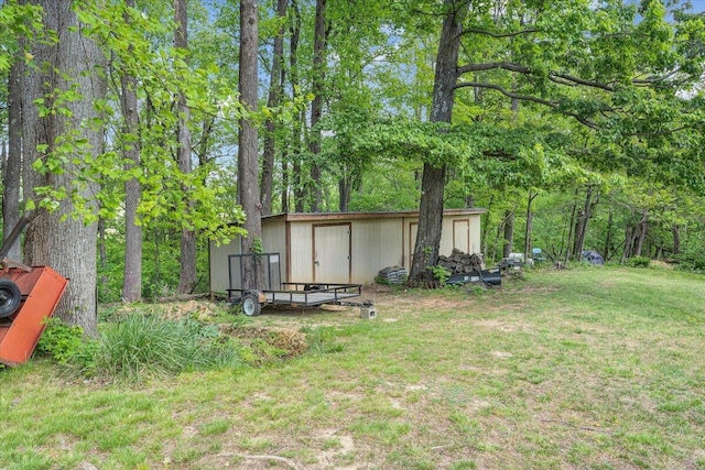 view of patio with a fenced in pool, a ceiling fan, an outdoor fire pit, and fence