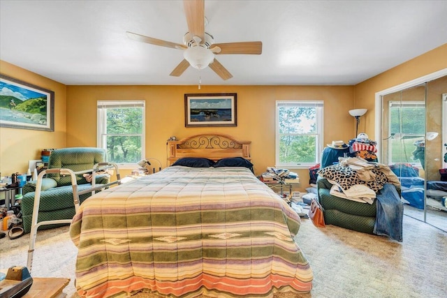 unfurnished room featuring baseboards, ceiling fan, and a healthy amount of sunlight