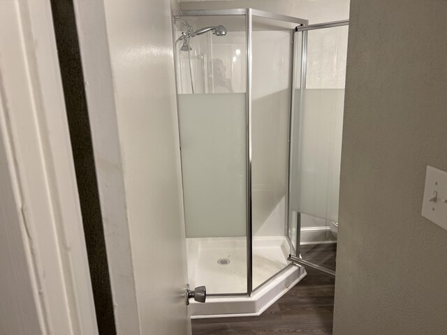 5320-5322 Carolyn Cir, Roanoke, VA 24018 - bathroom with a stall shower, wood finished floors, a textured wall, and toilet
