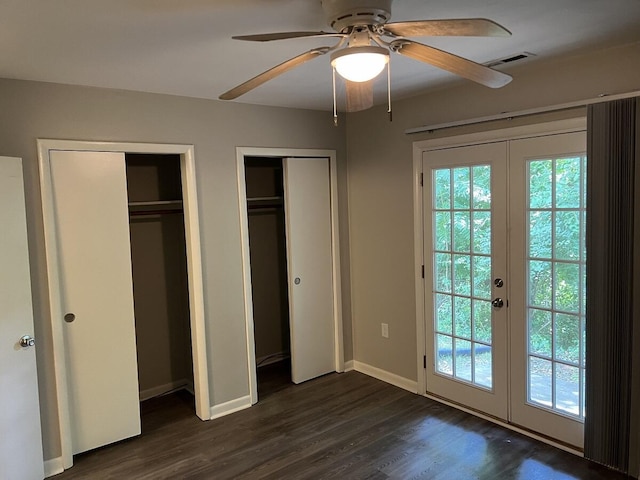 5320-5322 Carolyn Cir, Roanoke, VA 24018 - unfurnished bedroom with french doors, multiple closets, dark wood-style flooring, baseboards, and access to exterior