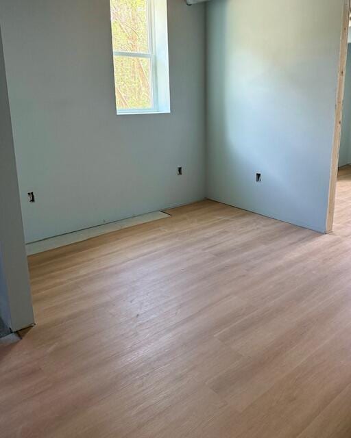 empty room featuring light wood finished floors