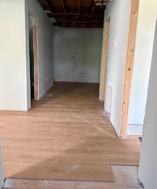 hallway with wood finished floors