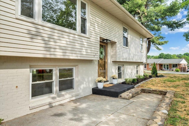 rear view of house featuring a patio area
