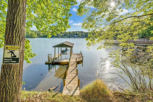 view of dock with a water view