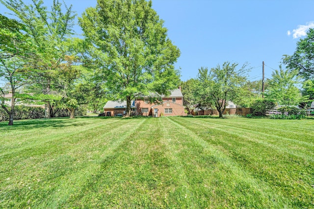 view of yard with fence