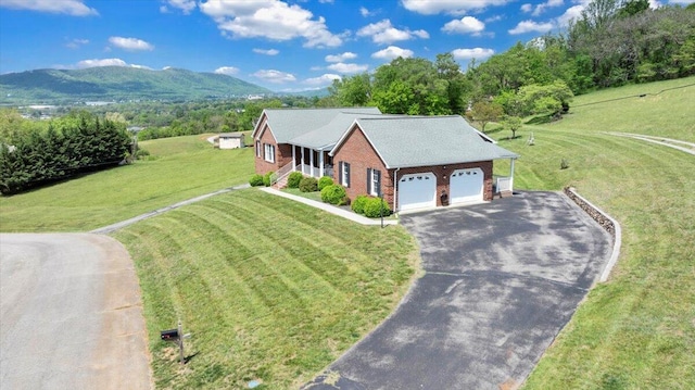 bird's eye view with a mountain view