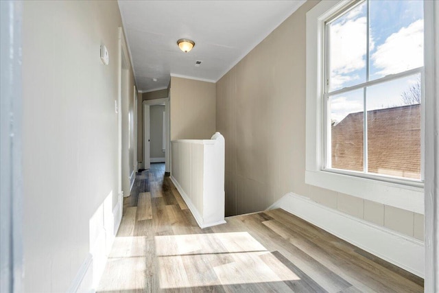 1012 Loudon Ave NW, Roanoke, VA 24016 - hall with crown molding and light wood-style flooring