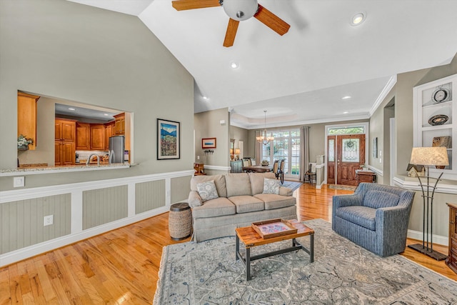 77 Sunview Cir, Moneta, VA 24121 - living room featuring light wood-style floors, baseboards, recessed lighting, ceiling fan with notable chandelier, and vaulted ceiling