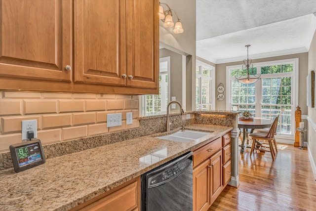 77 Sunview Cir, Moneta, VA 24121 - kitchen featuring crown molding, light stone countertops, a sink, black dishwasher, and light wood-type flooring
