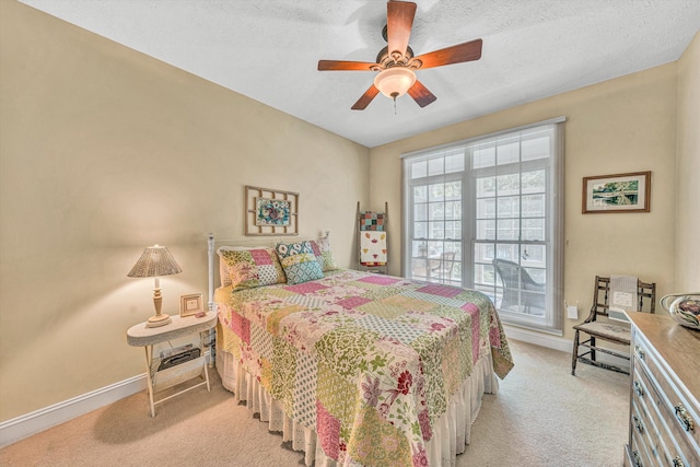 77 Sunview Cir, Moneta, VA 24121 - bedroom with baseboards, ceiling fan, light carpet, and a textured ceiling