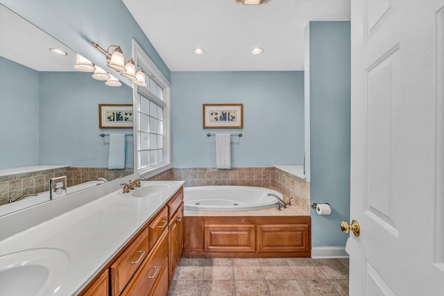 77 Sunview Cir, Moneta, VA 24121 - bathroom featuring a sink, tile patterned flooring, a jetted tub, and double vanity