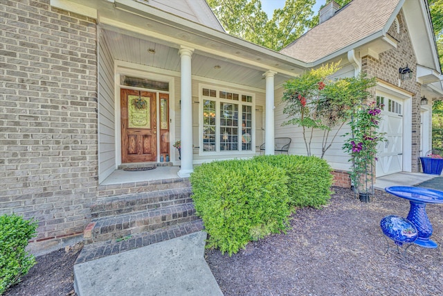 77 Sunview Cir, Moneta, VA 24121 - doorway to property with brick siding, a chimney, and a garage