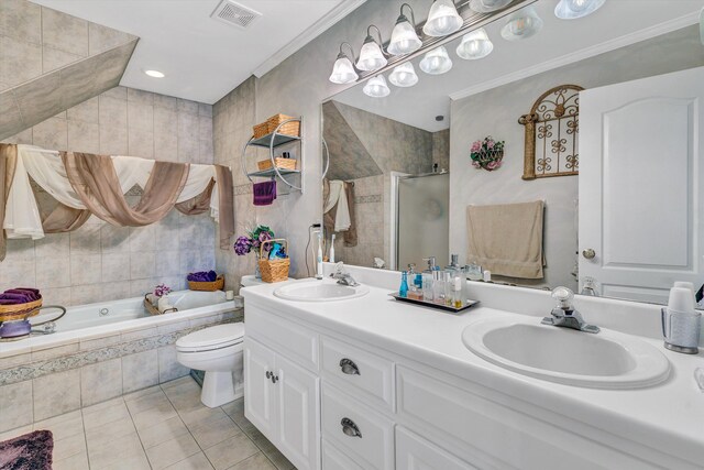 full bath with visible vents, a sink, a bath, and tile patterned floors