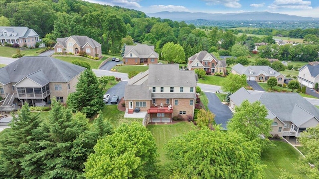 aerial perspective of suburban area with mountains