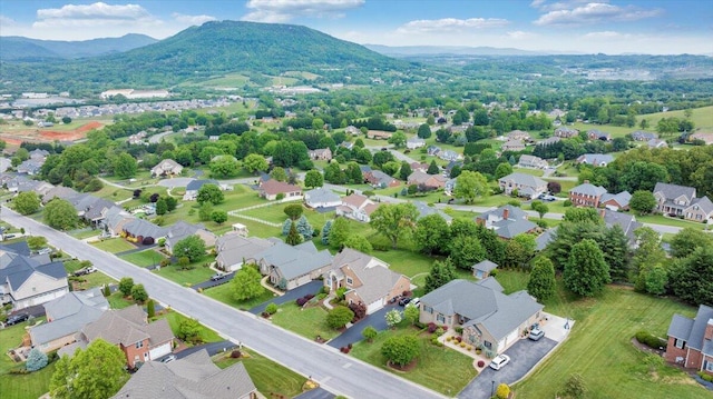 aerial view of residential area with mountains