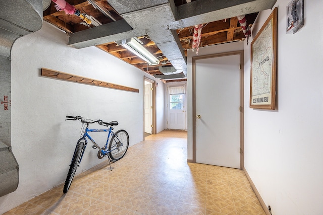 below grade area featuring tile patterned floors