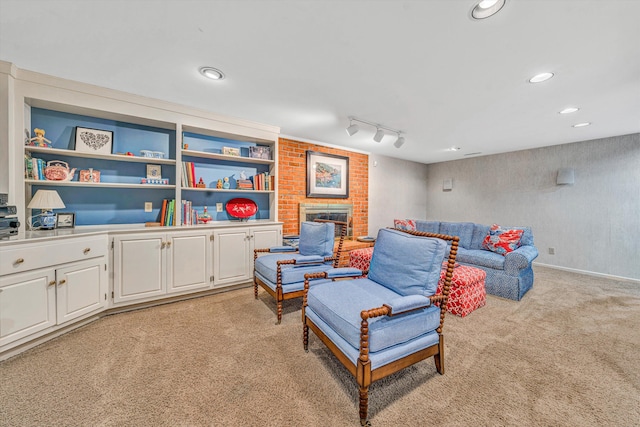 835 Wildwood Rd SW, Roanoke, VA 24014 - living area with light carpet, a fireplace, track lighting, and recessed lighting