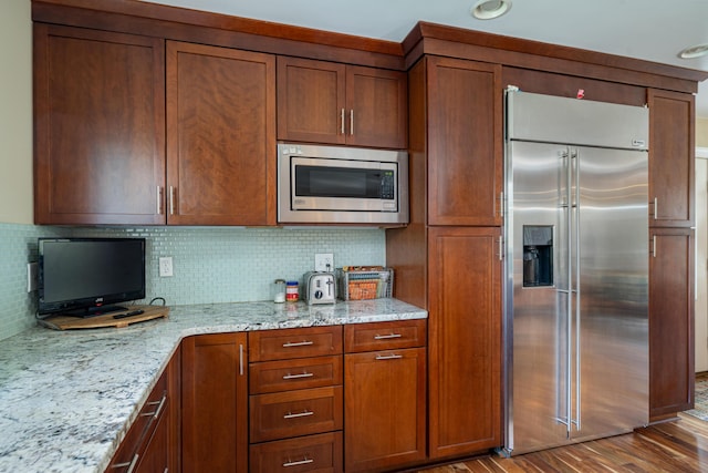 dining space with visible vents and light wood-style flooring