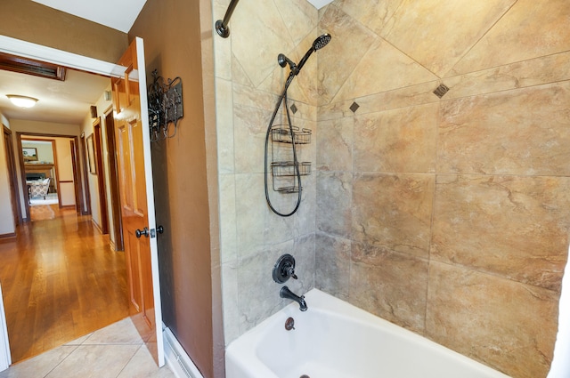 full bath with shower / bathtub combination and baseboards