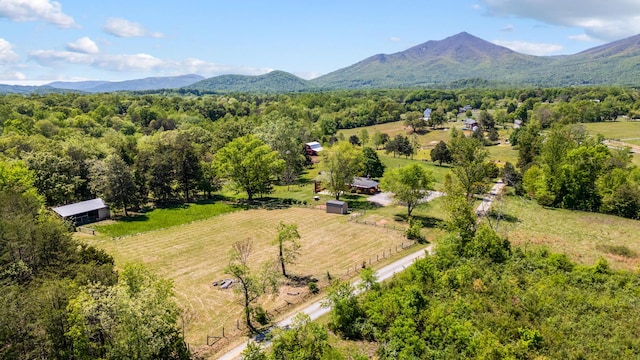 drone / aerial view with a mountain view and a rural view