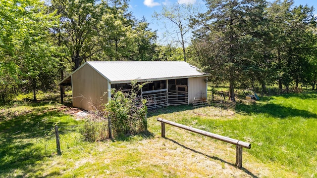 view of outbuilding with an outbuilding and an exterior structure