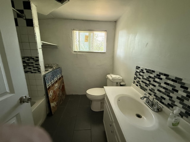 41 Hillcrest Ave NE, Roanoke, VA 24012 - bathroom with tile patterned flooring, toilet, backsplash, and vanity