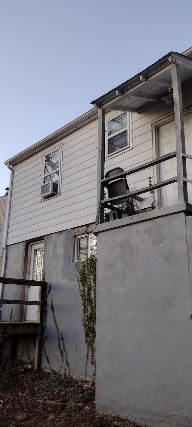 view of property exterior with cooling unit