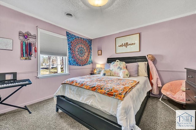 carpeted bedroom featuring crown molding, baseboards, a textured ceiling, and visible vents