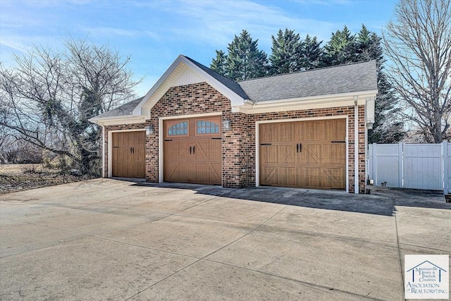 garage featuring fence