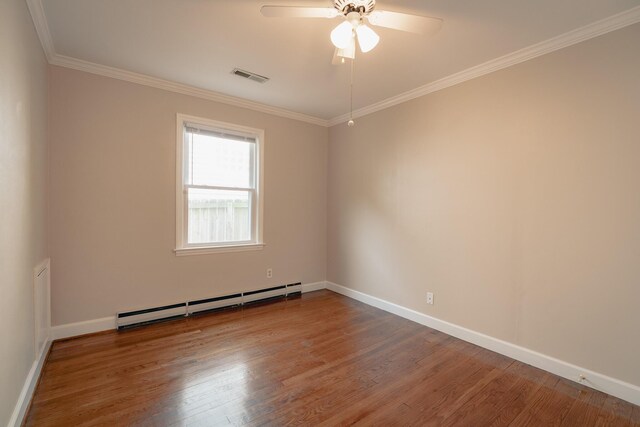 2509 Sweetbrier Ave SW, Roanoke, VA 24015 - spare room featuring visible vents, ceiling fan, wood finished floors, and baseboard heating