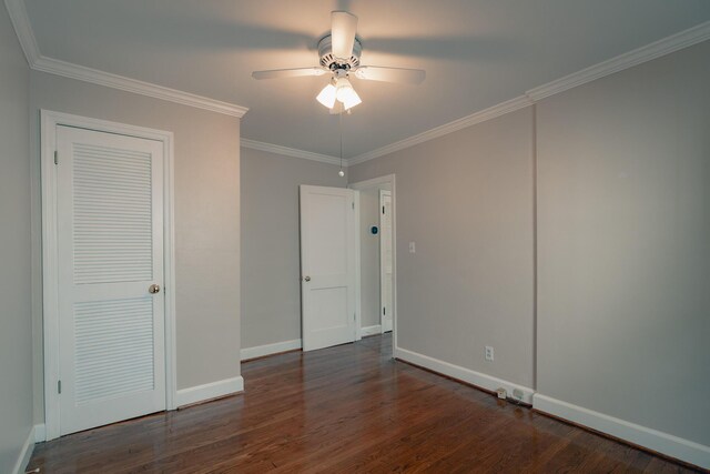 2509 Sweetbrier Ave SW, Roanoke, VA 24015 - unfurnished bedroom featuring baseboards, ornamental molding, dark wood-style flooring, and a ceiling fan