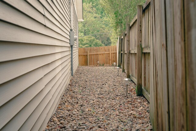 2509 Sweetbrier Ave SW, Roanoke, VA 24015 - view of side of home with fence and a wooded view