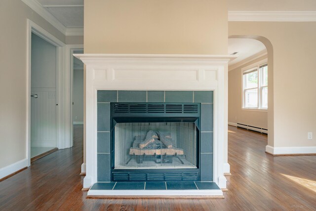 2509 Sweetbrier Ave SW, Roanoke, VA 24015 - room details featuring crown molding, a tile fireplace, and a baseboard radiator