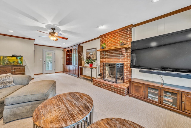 carpeted living room with ornamental molding, a ceiling fan, a fireplace, baseboards, and recessed lighting