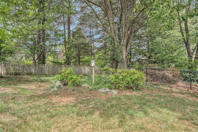 view of yard with fence