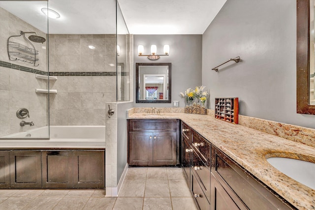 bathroom with tile patterned flooring, double vanity, and bathtub / shower combination