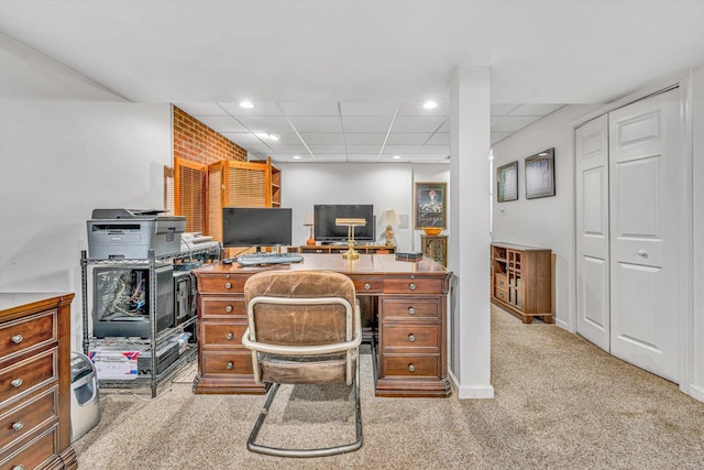 office area featuring a paneled ceiling, carpet flooring, recessed lighting, and baseboards