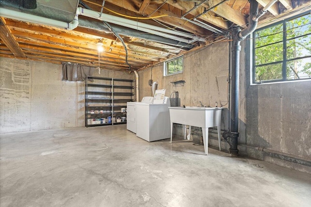 below grade area featuring independent washer and dryer