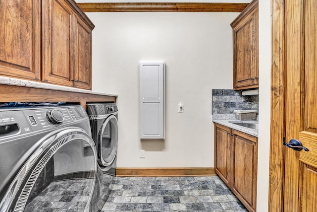 890 Blain Rd, Buchanan, VA 24066 - clothes washing area featuring cabinet space, washer and clothes dryer, baseboards, stone finish floors, and ornamental molding