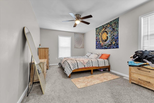 bedroom with baseboards, a ceiling fan, and carpet flooring